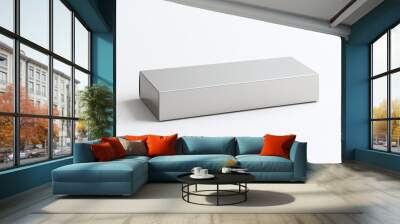 A minimalist, rectangular metallic silver box with sharp edges, placed on a white background Wall mural