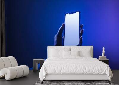 Hand holding mobile mock up Wall mural