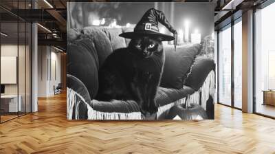 Vintage Creepy black and white picture of black cat in witch hat, jack-o'-lantern and candles on the sofa in Halloween misty night Wall mural