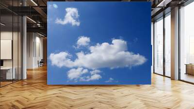 Blue sky clearly background with clouds Wall mural