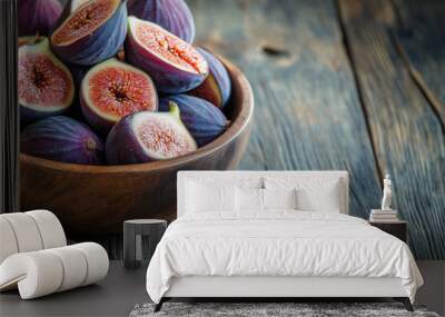  A wooden bowl filled with whole figs and sliced fig fruits on an old rustic table, with ample space for copy.
 Wall mural