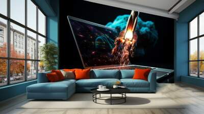 Startup and motivational concept with rocket flying out of laptop screen on black background Wall mural