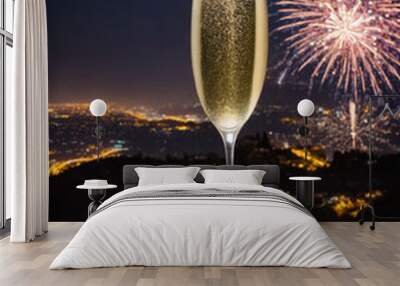 glass of champagne standing on a black stone with pomegranates, fireworks in the background, new year symbols, luck charm, Greek tradition, happiness, joy. Generative AI Wall mural