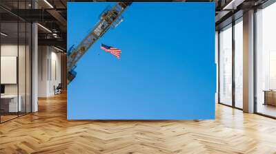 american flag flying from construction crane Wall mural