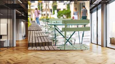 Seating in a downtown urban shopping plaza Wall mural