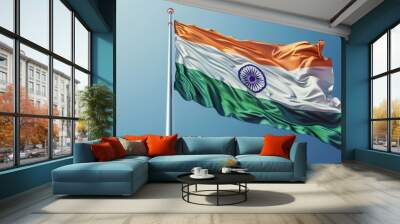 National flag of India on a flagpole waving on blue sky background. Wall mural