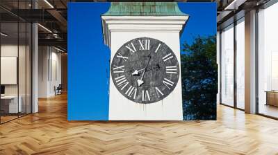 Clock tower in old town. Historical building. Petrovaradin castle, Novi Sad, Serbia. Wall mural