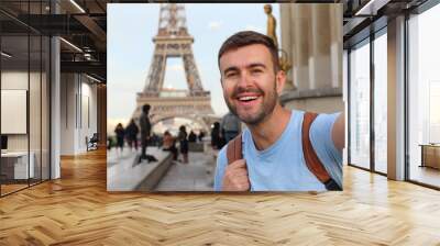 Ecstatic tourist in the Eiffel tower  Wall mural