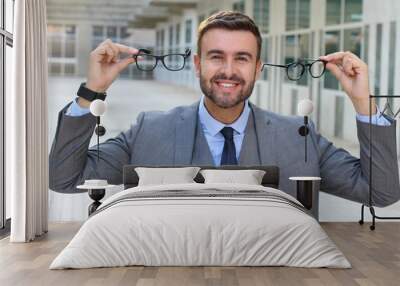 Elegant male excited with his new pair of spectacles  Wall mural