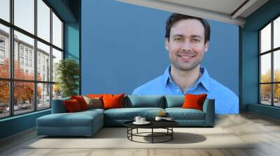 Joyful male smiling isolated close up with copy space  Wall mural