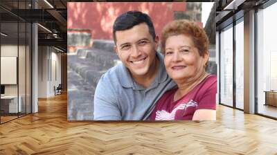 Single Hispanic mature mother with only one adult son Wall mural