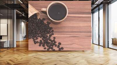 concept of drinking coffee Coffee beans and coffee cups are on the table Wall mural