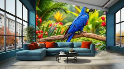 8. A delicate, Alice Blue macaw perches on a wooden branch, surrounded by lush green leaves and exotic flowers, in a vibrant jungle setting, a realistic photo image. Wall mural