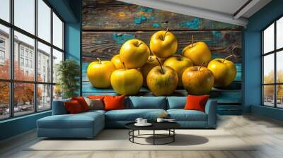 8. A still life of cadmium yellow apples arranged artfully on a worn wooden table, a realistic photo image. Wall mural