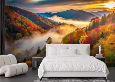 Misty dawn light illuminates the gentle curves of a mountain road, snaking through a dense forest of vibrant autumn foliage, showcasing the beauty of the mountain landscape. Wall mural