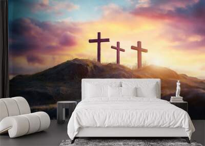 sunset glow across sky, cross atop mountain seemed to illuminate with divine light, a powerful symbol of Jesus Christ and the profound connection between God and religion amidst drifting clouds. Wall mural