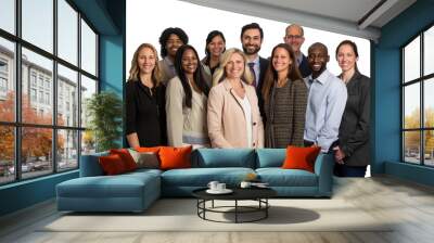 A diverse group of corporate employees happily posing for a group photo. Wall mural