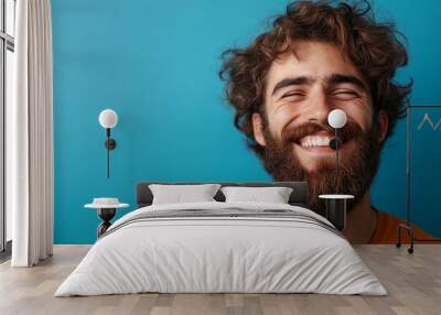 cheerful man with beard laughing against blue background, Generative AI Wall mural