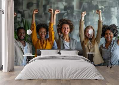 Diverse group of professional young business people standing together with raised arms in a fist at office, Generative AI Wall mural