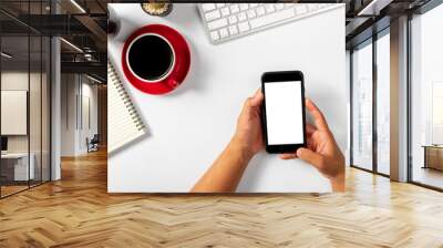 Male hands using smartphone mockup at the white office desk. Blank screen mobile phone for graphic display montage Wall mural