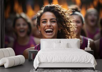 A Group of Vibrant Female Athletes Celebrate with Laughter and High-Fives Wall mural