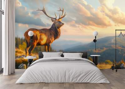 A majestic red deer with impressive antlers stands proudly overlooking an expansive and scenic landscape of rolling hills Wall mural