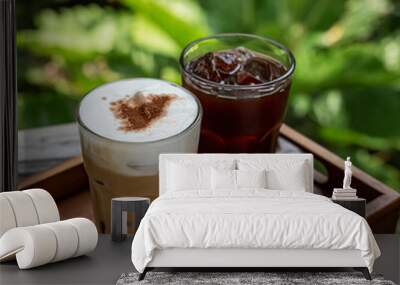 Coffee latte and americano with ice on a wooden tray ready to serve Wall mural