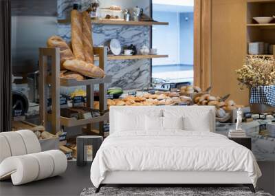 A variety of fresh homemade bread and bakery corner in luxury hotel breakfast buffet, restaurant interior. Wall mural