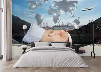 Double Exposure of a businessman handshake  with Map global partner connection of Container Cargo freight ship for Logistic Import Export background (Elements of this image furnished by NASA) Wall mural