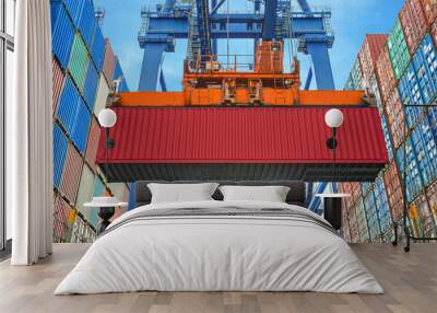 shore crane loading containers in freight ship Wall mural