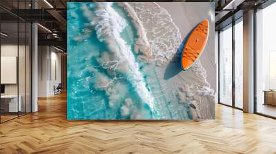 An orange and blue paddleboard on the beach, a bird's eye view, high definition photography, clean white sand, clear turquoise sea water, waves lapping at shore edge, and a sense of calmness. Wall mural