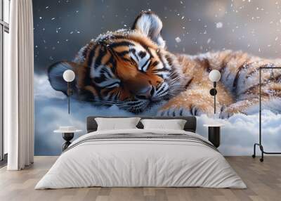 The soft body of a cute baby tiger is resting comfortably in a fluffy snow pile. The cold winter atmosphere surrounds it with snow covering the area Wall mural