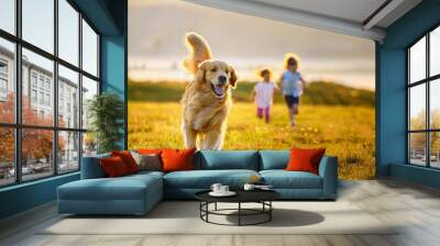 a dog running with two children in the background Wall mural