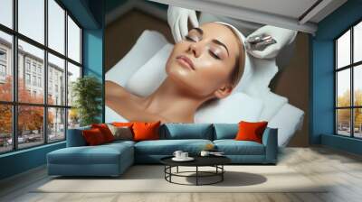 Laser Treatment, Laser epilation and cosmetology, ultrasound face treatment in medical spa center, Doctor doing laser face and hair removal treatment, skin care concept by using laser Wall mural