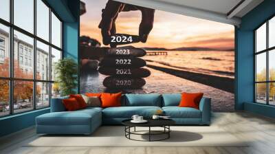 Happy new year 2024 replace old 2023. New Year 2024 is coming concept idea on orange sky. High resolution creative photo image can be used as large display, print, website banner, social media post.	 Wall mural