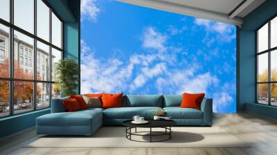 Blue sky with clouds background Wall mural