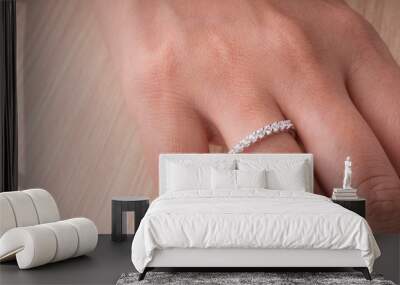 Jewel ring on woman hand Wall mural