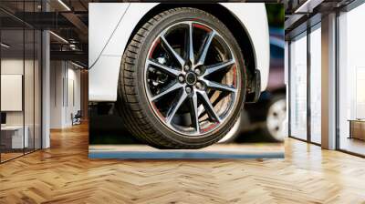 sports car wheels, low profile tires on aluminum rims, closeup Wall mural