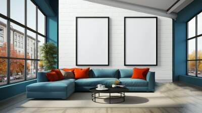 two black frames for photographs or paintings on a white wall. concept mockup, empty meta for images Wall mural