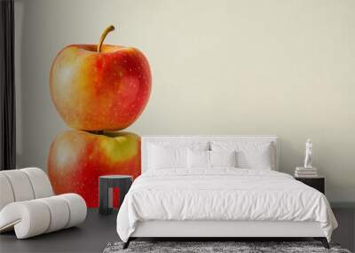 Two fresh red apples stacked on top of each other against a plain light background, creating a minimalist and clean composition
Concept: fresh apples, minimalism, healthy food, balanced diet, organic  Wall mural