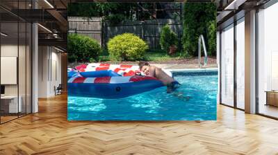 Teens have fun in swimming pool in the summer 2020. Home water kids party  Wall mural