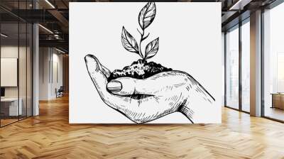 Hand hold plant. Hand drawn illustration converted to vector Wall mural