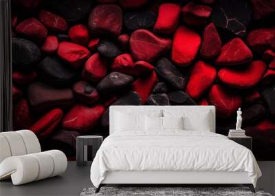 A collection of carmine and magenta rocks creating a striking pattern against an electric blue and black background, resembling a flowering plant in a font of entertainment Wall mural