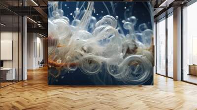 A group of white bubbles are seen floating on top of the pond water, creating a unique visual texture. These bubbles may be caused by gases released from organic matter or aquatic plants underneath Wall mural