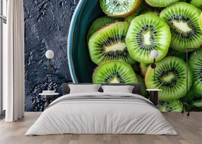 A pile of unpeeled whole green kiwi fruits in a bowl Wall mural