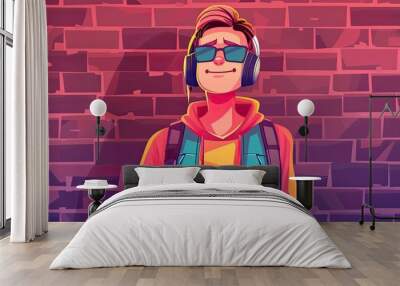 A young man with purple headphones and magenta sunglasses stands in front of a pink brick wall. He is wearing a sleeveless pink shirt while listening to music and enjoying the entertainment Wall mural