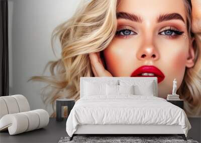 Beautiful young woman with blonde hair and bold red lipstick showcasing modern femininity and elegance Wall mural