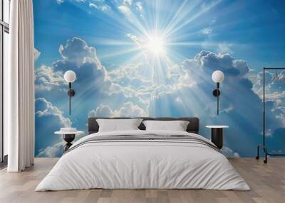 Blue sky with soft clouds and the sun peeping behind a white cloud Wall mural