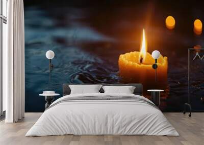 Candle-lit nighttime darkness. Wall mural