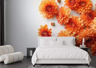 Close up bouquet of orange chrysanthemum flowers on white background with copy space Wall mural